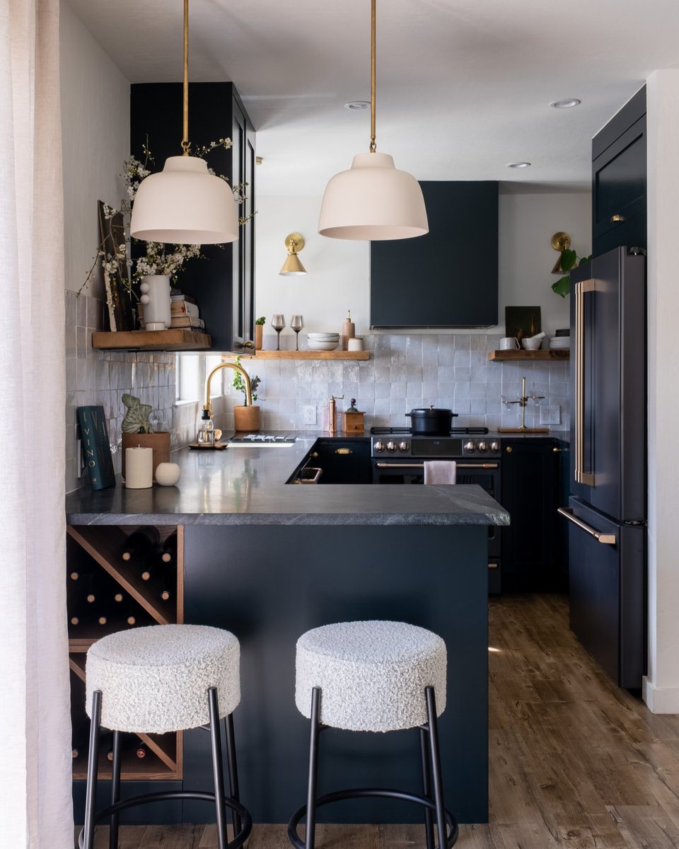 It is often said that small spaces should always be light and bright but we're breaking all the rules in this kitchen! While you can follow design standards, there are ultimately no rules in design. We focus on function and from there, we bring in style creating spaces that you d