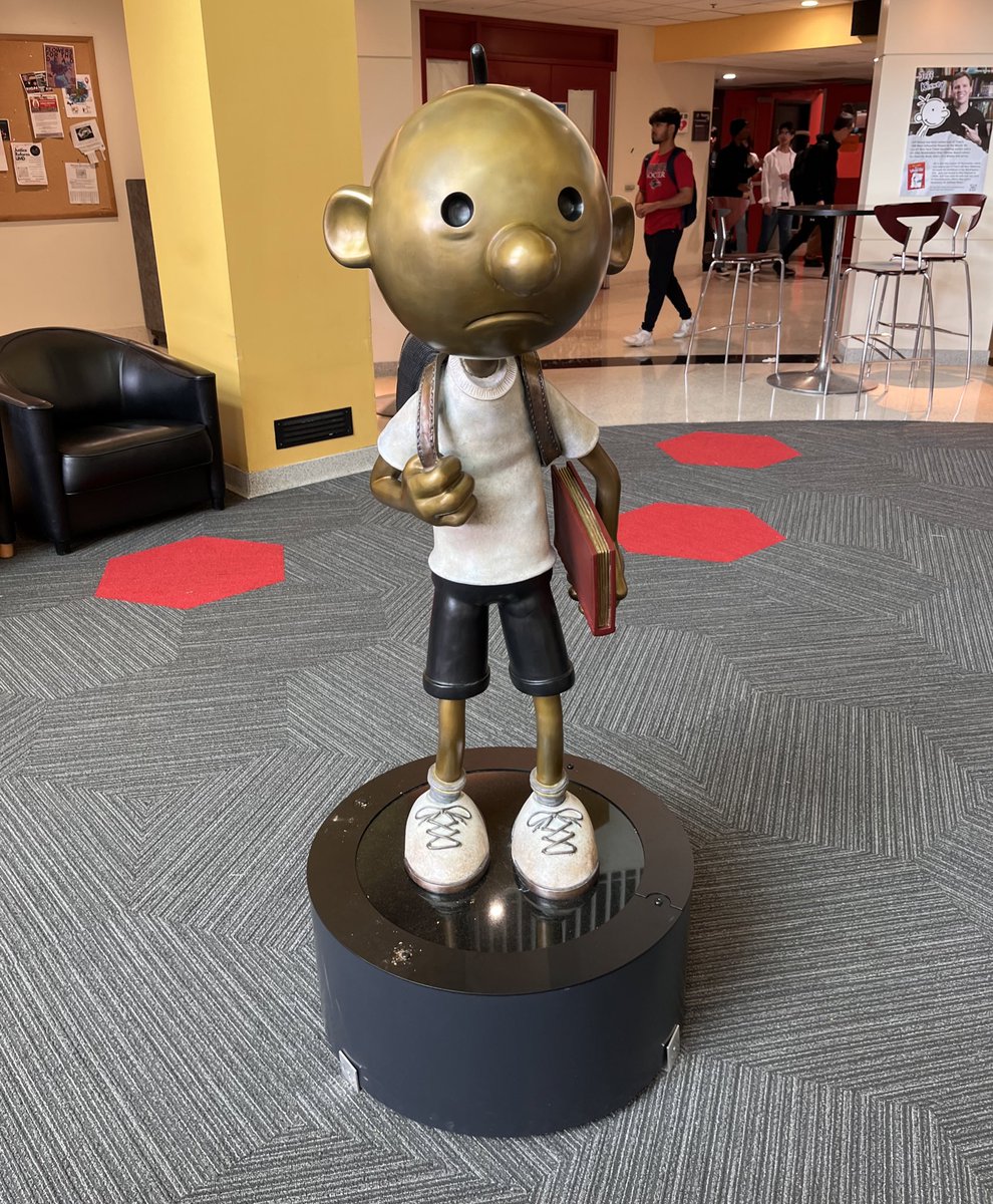 my university had the opportunity to do the funniest thing ever and they did it by unveiling a greg heffley statue