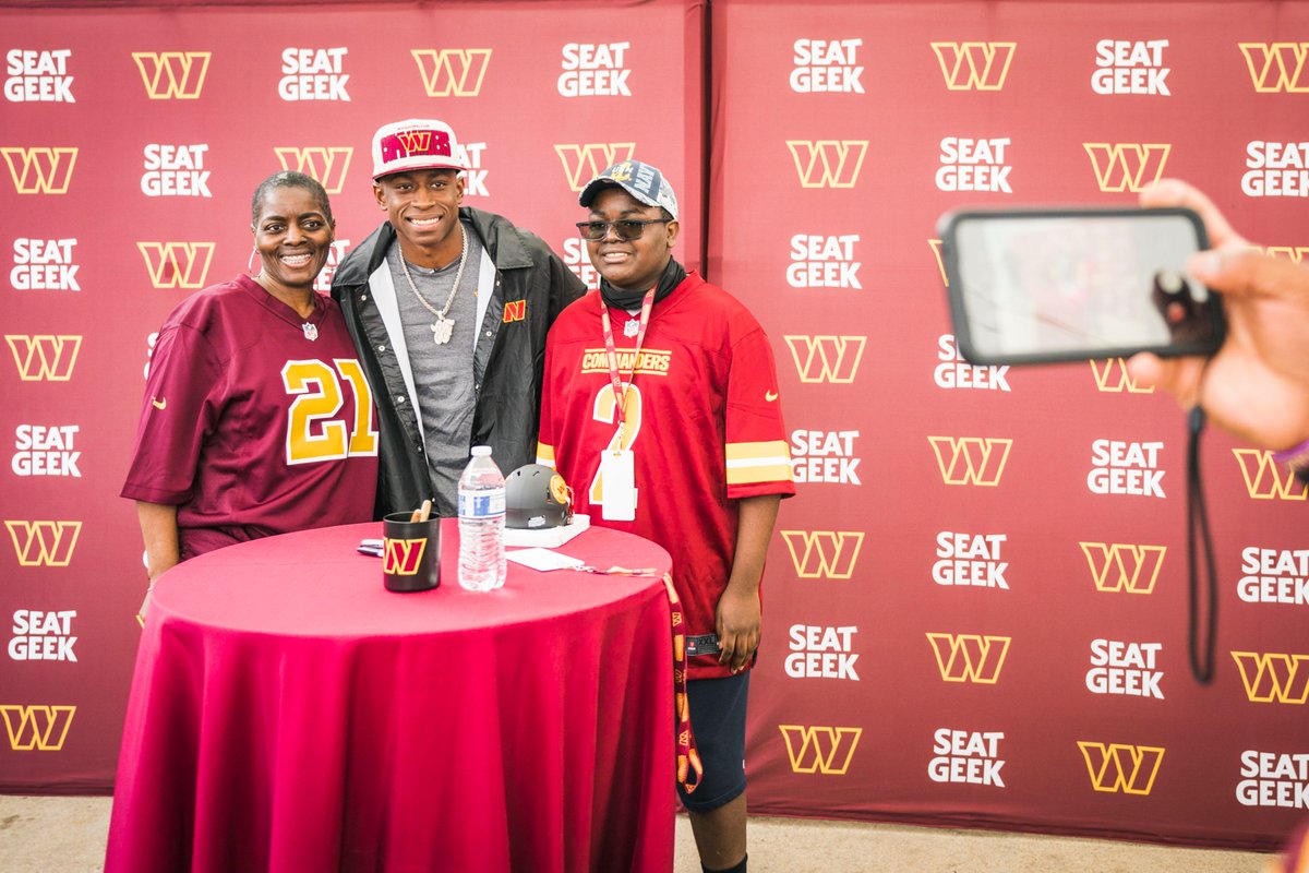 Commanders's tweet photo. The new guy meets the fam 💛

@NationalHarbor x @SeatGeek https://t.co/FM0kiDQvpA