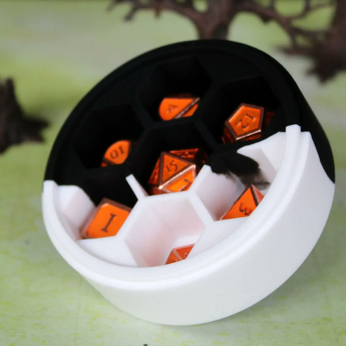 DiceDungeons's tweet photo. Protect your dice in our new silicone cases. The honeycomb insets stretch to fit even over-size dice. Easy to open and close. https://t.co/JjZzYu2XgG #DungeonsandDragons #DiceCase #TTRPG https://t.co/cHxWSL71Xg