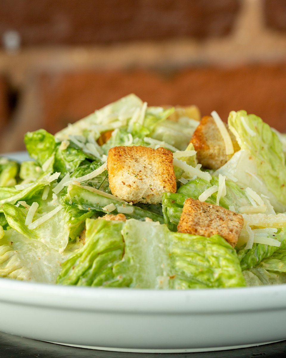 Caesar salad: because sometimes you need to pretend you're eating healthy while secretly indulging in cheesy, garlicky goodness