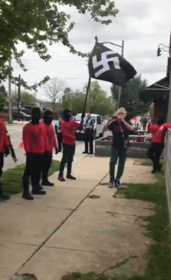 Dementia_Grimm's tweet photo. The Neo-Nazi group "The Aryan Sons" on the streets of Columbus, Ohio today, chanting "No More Trans On Our Streets". This is who Gender Criticals, TERFS, and Anti Medical Science Grifters share an ideology with. To say the Wrong Side Of History, would be an understatement. https://t.co/kN447bO5DP