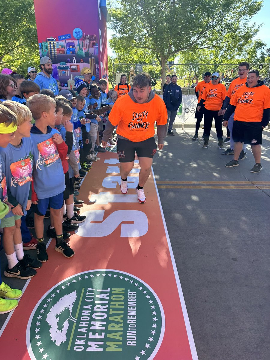 1BroncoFootball's tweet photo. Today our Bronco Football O-Line lived out a core value that we have here at Mustang! “Love others as much as yourself.” It was awesome to see our guys have so much fun running with &amp; helping to keep safe the 2000+ kids running at the OKC Memorial Kids Marathon! #CharacterLeaders https://t.co/NQNvcIbDIG