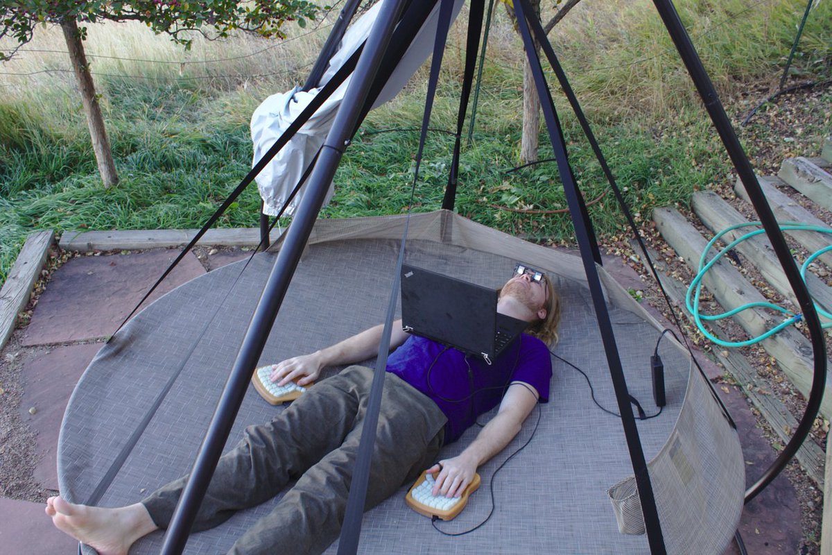 treetopian's tweet photo. @soychotic @supersat I've tried climbing belay glasses upside down for this, and it sorta worked but the narrowish field of view and chromatic aberration interfered.  Yours look more suited to the application!  Pic from an old blog post about computing in this posture - https://t.co/Dih4vIhEvA https://t.co/XBuvtjGbkV