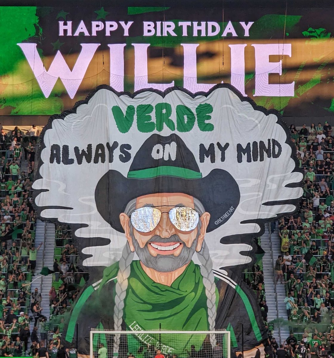 LosVerdesATX's tweet photo. Happy 90th Birthday @WillieNelson!

#VERDE always on my mind 💚 

🎨@bethbeeart 📷 @arubiophotos 

Legalize #verde #AustinFC https://t.co/1dLjHfmjWs
