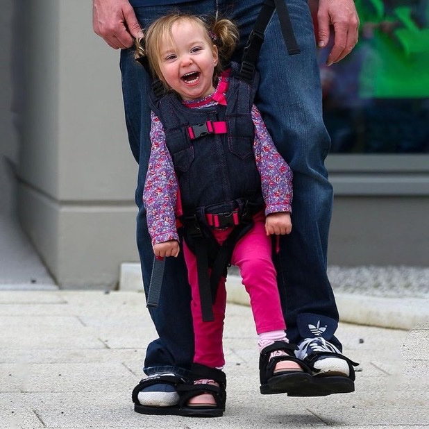 DailyLoud's tweet image. Father designs shoes to allow his paralyzed daughter to experience walking 🙏❤️