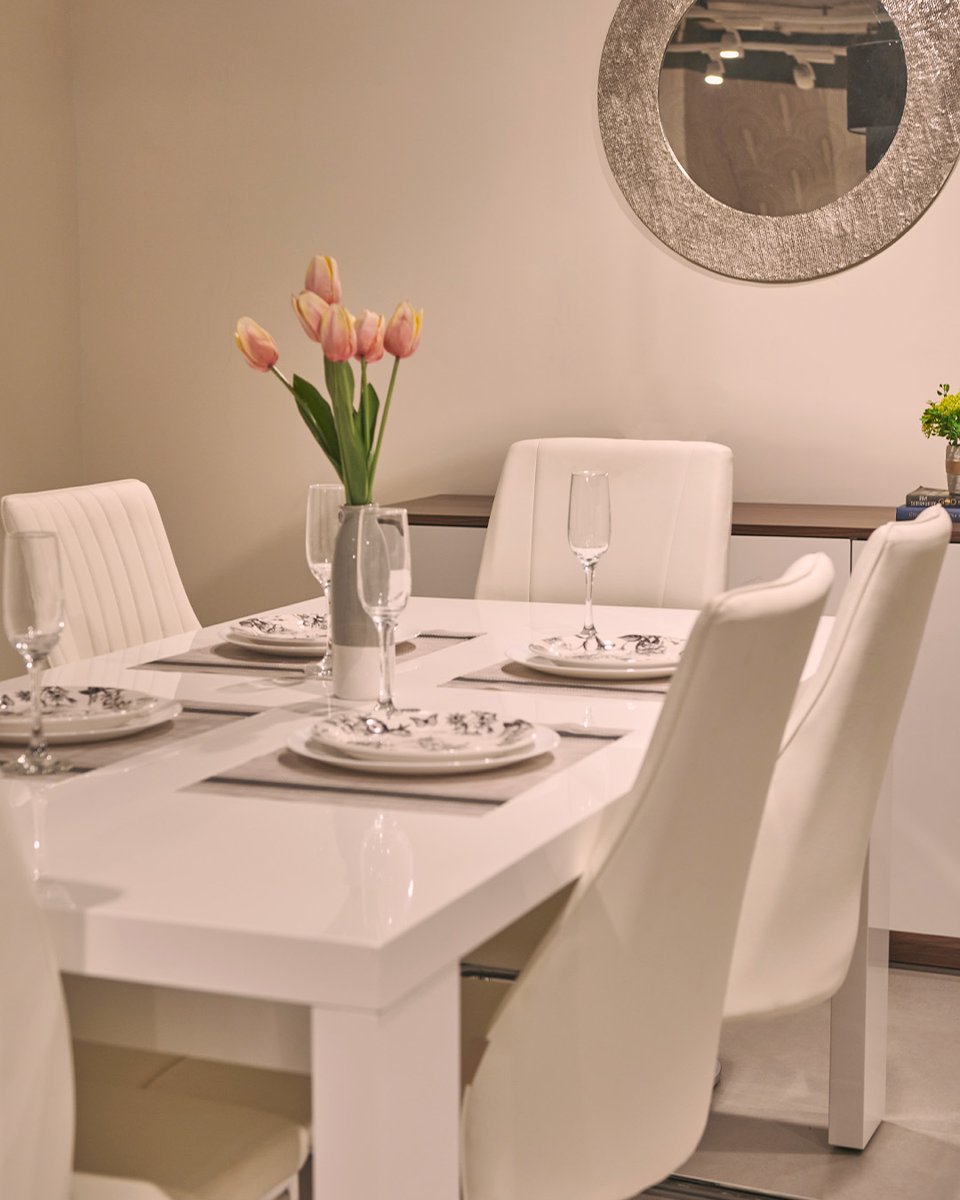 Clean and classic. The white monochromatic dining room is perfect for your rejuvenating summer dinner parties! 

Featured here is our Kariba Dining Table, Seneca Dining Chairs, Ingrid Dining Chairs, and Baltoro Sideboard. 

#urbanladder #diningroom #summerdinner #moderndesign