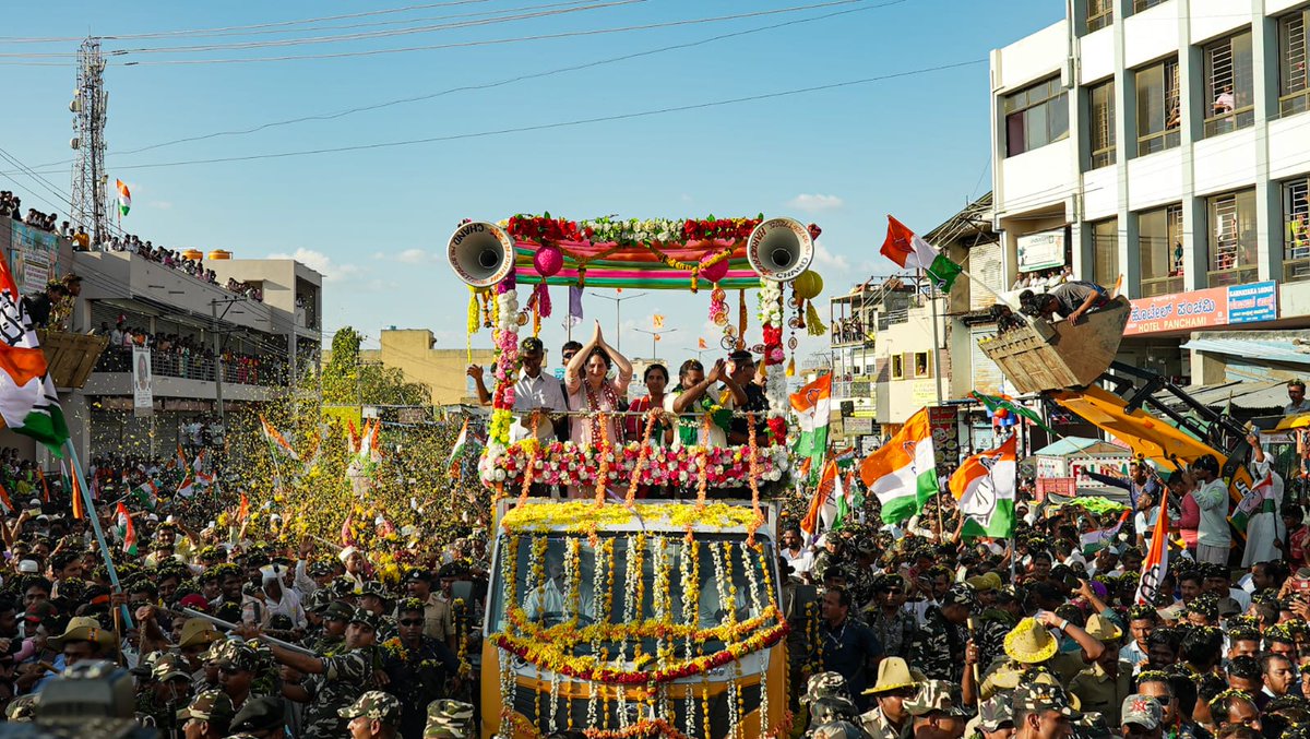 INCIndia's tweet photo. Congress Gen. Sec. Smt. @PriyankaGandhi ji's massive road show in Kudachi witnessed an overwhelming response as people from all walks of life thronged the streets to show their support.

The sea of enthusiastic supporters, waving flags and chanting slogans was a testament to the widespread appeal of her message & the hope she has instilled in the hearts of Kannadigas. 

📍 Kudachi, Karnataka