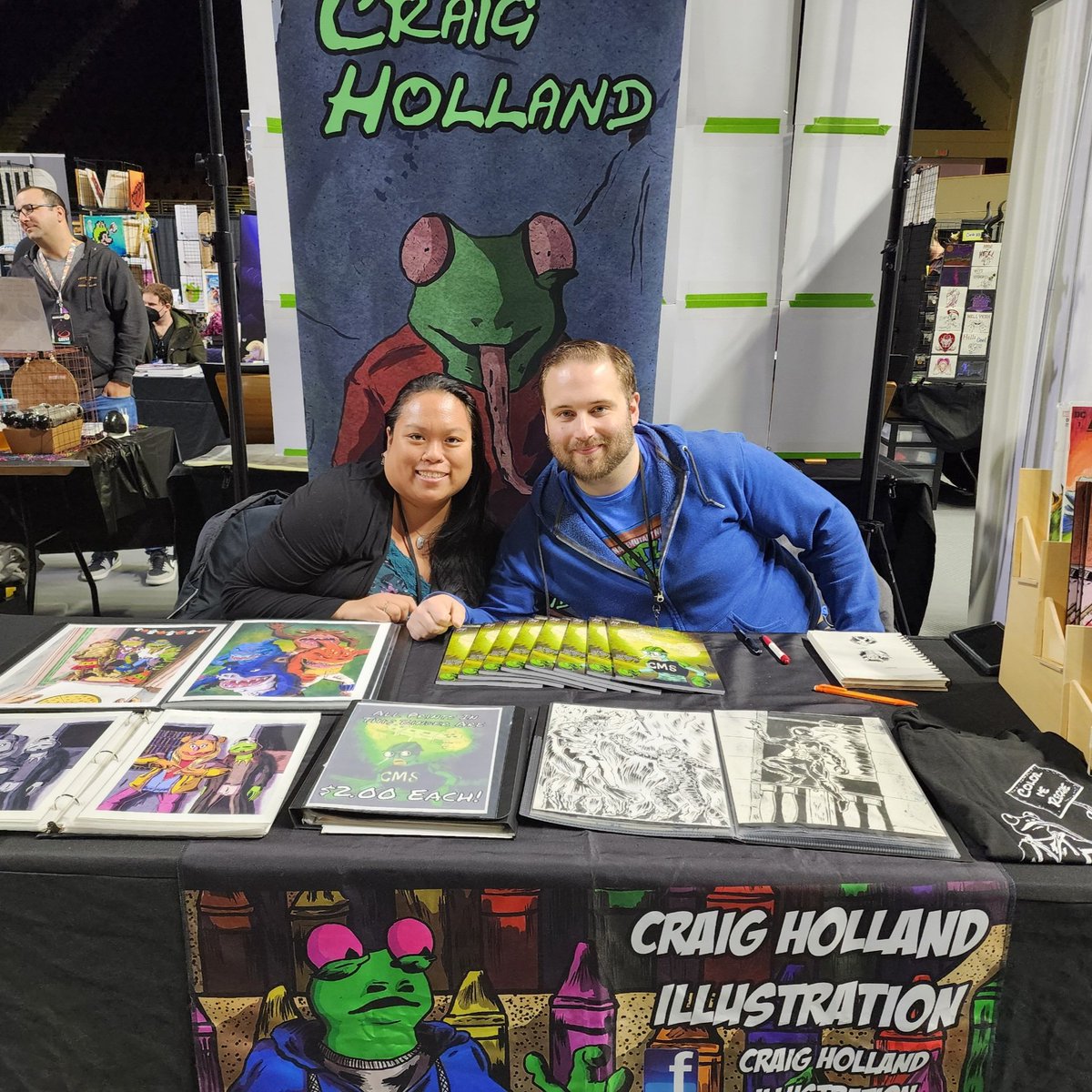 CHollandArt's tweet photo. When my wife helped out at my table yesterday :).

Day 3 of @MEComicandToy is underway! Who will I see?

#mctc #mainecomictoycon #portland #maine #crossinsurance #comics #makecomics #colormereggie #cmsbook #creatorownedcomics #nabthenineties #chollandart https://t.co/wA65z0Xojc