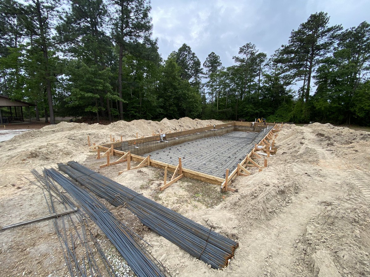 This new hole in the ground at #CampKinard is starting to look more and more like a swimming pool! #holyspaces