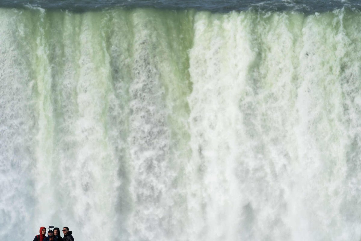 Tourists take a group selfie at the top of Horseshoe Falls at Terrapin Point in Niagara Falls State Park in today's #EveryDayAPhoto by @Bessex_Joshua buffalonews.com/multimedia/eve…