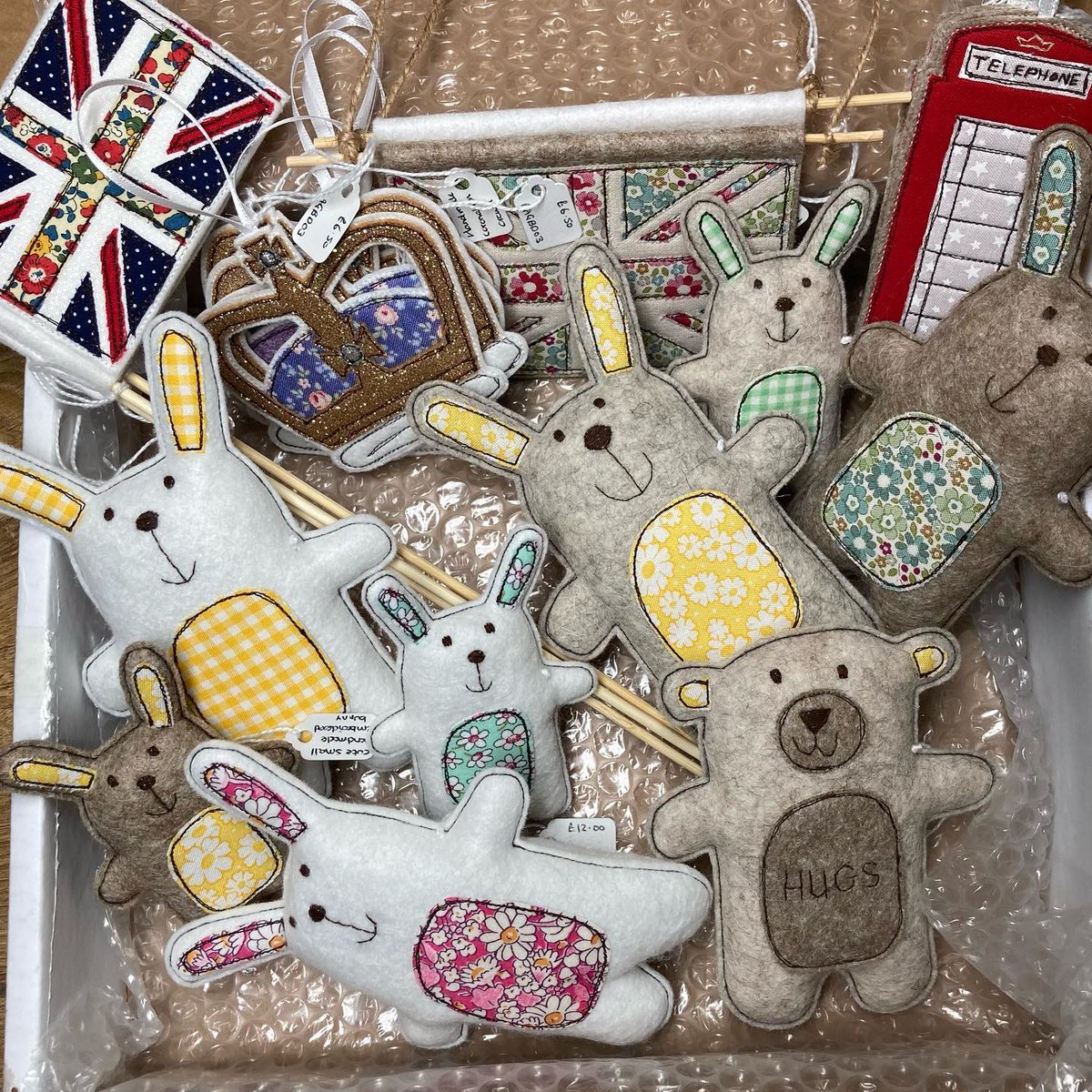 Could the contents of this box from @aliceandaudrey  be any cuter?! Coronation decs AND mini hug bunnies! Open as normal today (Sunday) and tomorrow (Bank Holiday Monday)…do pop in! #bunnies #unionjackflag #Coronation  #coronationsouvenir #ingleton #yorkshiredales #ShopIndie