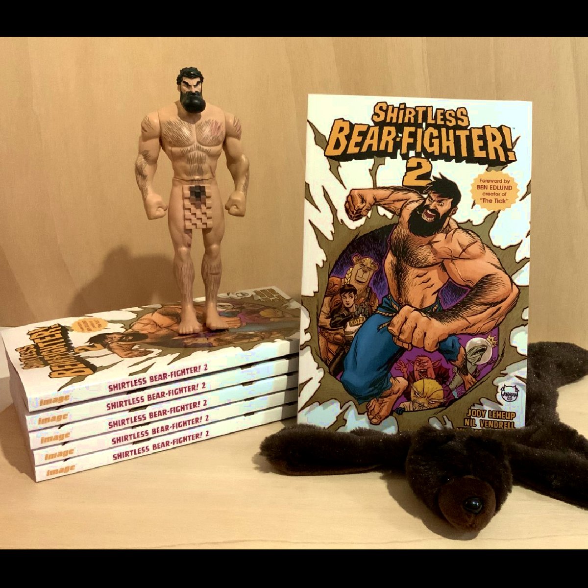 TPB edition of Shirtless Bear-fighter 2! it's now available on all the finest comicbook stores!
More than 200 pages of pure Bear-Fighting action, frontal nudity and Flapjacks!
By  <a href="/JodyLeHeup/">Jody LeHeup</a> @SpicerColor Troy Peteri <a href="/artmonkeys/">Artmonkeys Studios</a> @SGirner and me for <a href="/ImageComics/">Image Comics</a>