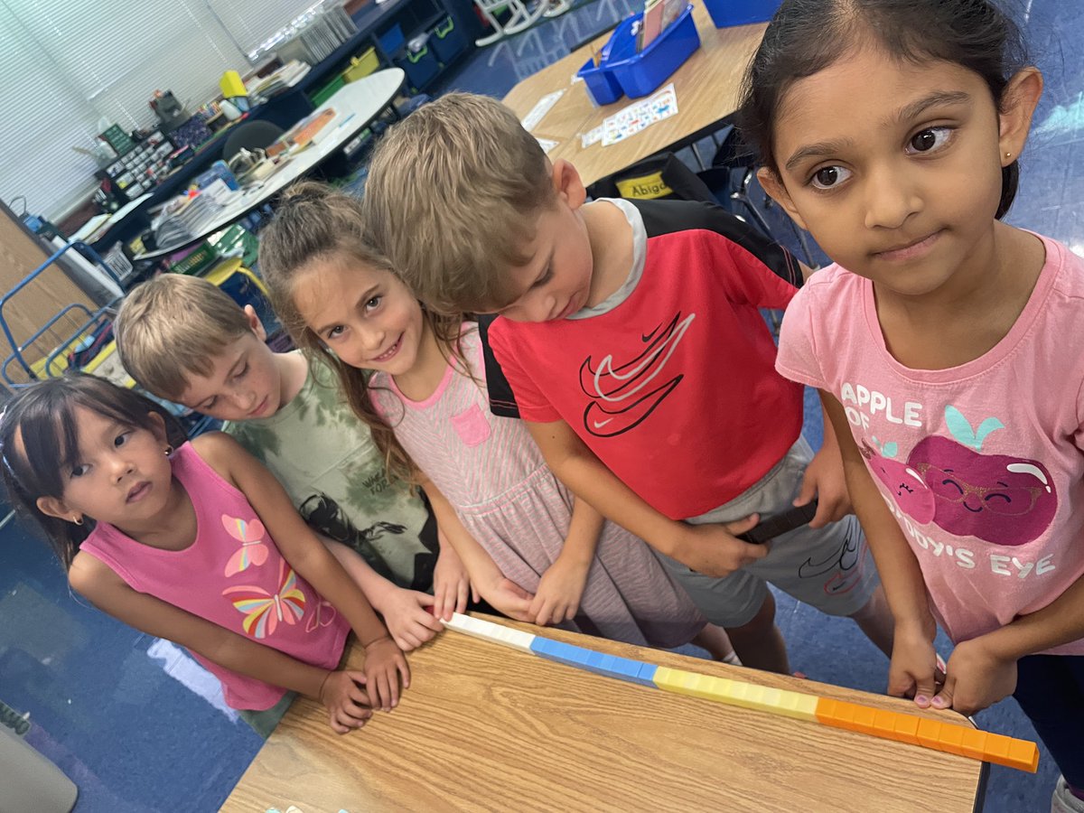 Bees4evr's tweet photo. The @bees4evr really ‘measure up’. Table too long? Phone some friends! We are loving this math unit!  #beesforlife #bumblebeefamily 
#mathmatters https://t.co/T4afBzvbp3
