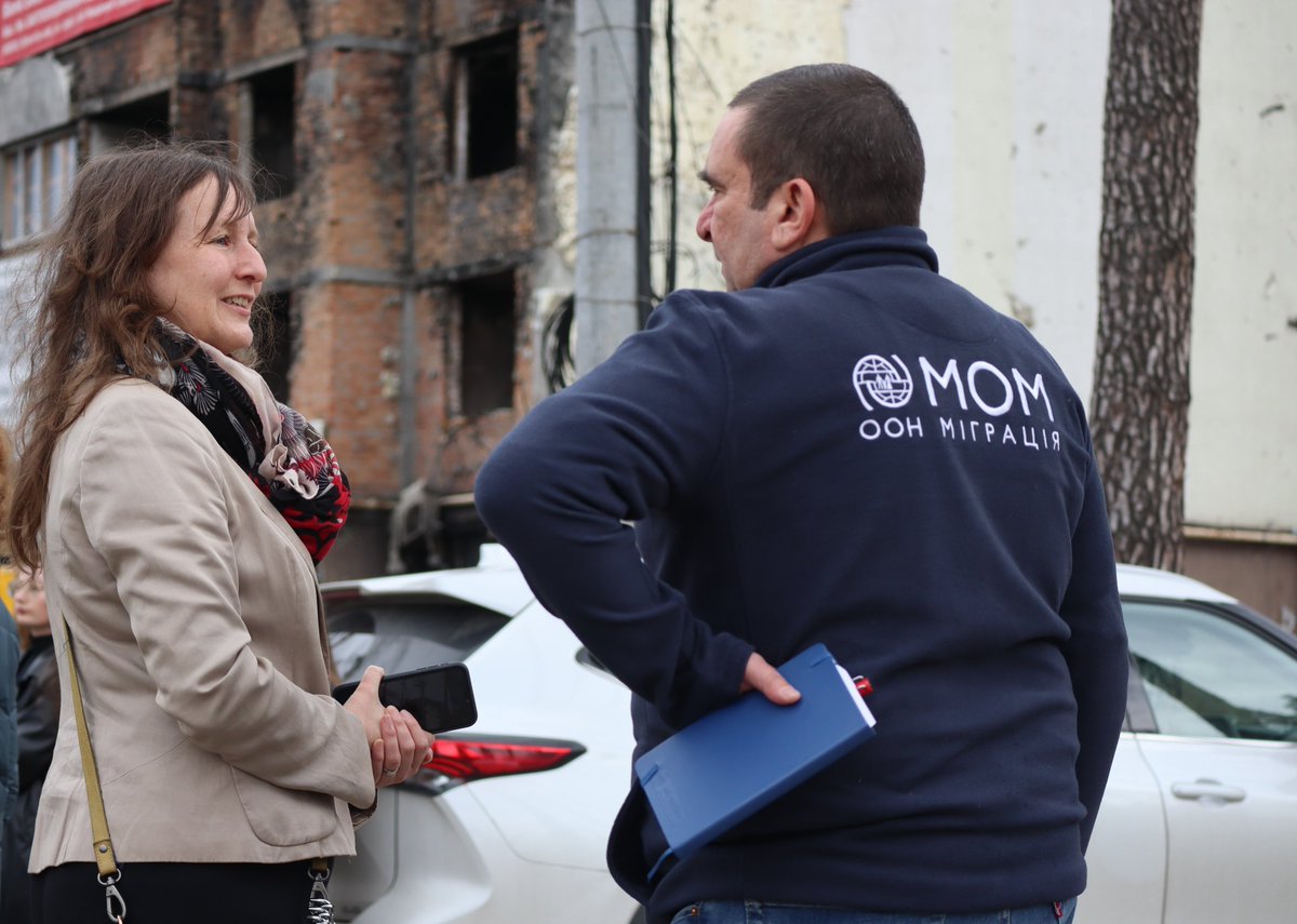 IOMUkraine's tweet photo. IOM is about to start a construction of a 9-story apartment building in Irpin to replace a demolished one, irreparable after the shelling. @JochenFlasbarth  visited the site to discuss how @BMZ_Bund can support recovery efforts in 🇺🇦 and create conducive conditions for return. https://t.co/9dj2tb13kf
