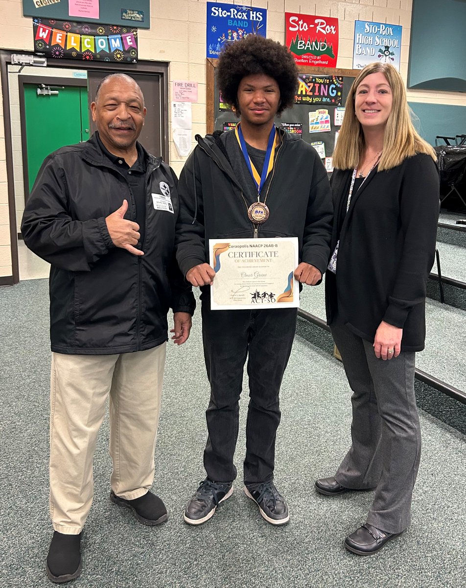 StoRoxSD's tweet photo. WAY TO GO: Omar Greene recently won a Bronze Medal in the Instrumental Classical Category (Tuba) at the 2023 @CoraopolisNAACP ACT-SO Competition. He's pictured here with Carter Spruill, President Coraopolis NAACP; Omar Greene; Suellen Engelhard, music teacher. Congrats, Omar! https://t.co/vwvYTkdL5x