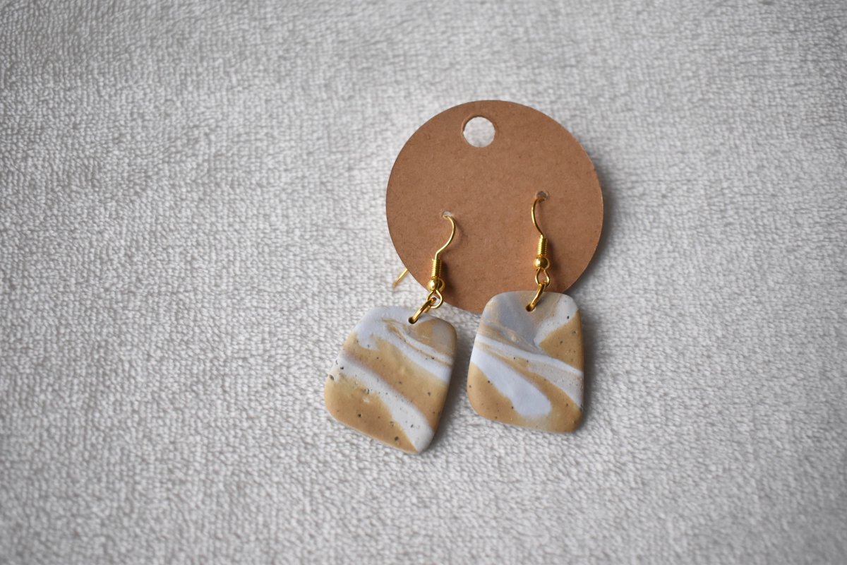 NGClayCo's tweet photo. NEW on the Etsy shop! 🤩 check em out at https://t.co/4jZTaujSz7 🤍🤎 #clayart #claycreations #jewelry https://t.co/Z3XpLY02KQ