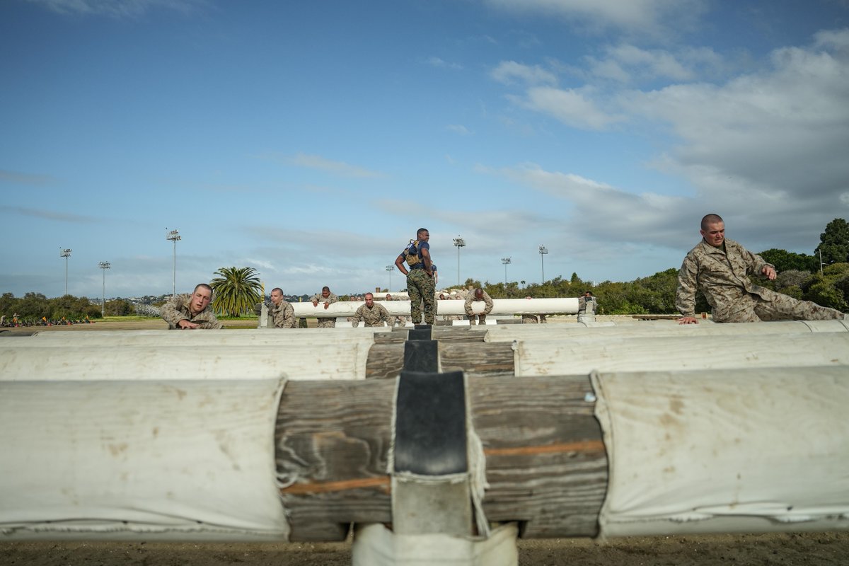 USMC's tweet photo. #MarineCorps recruits conduct an obstacle course at @MCRD_SD, April 14.

The obstacle course is one of the many physical training events used to prepare recruits to become United States #Marines. 

#RecruitTraining #USMC #recruits https://t.co/O0fFGDP5y6