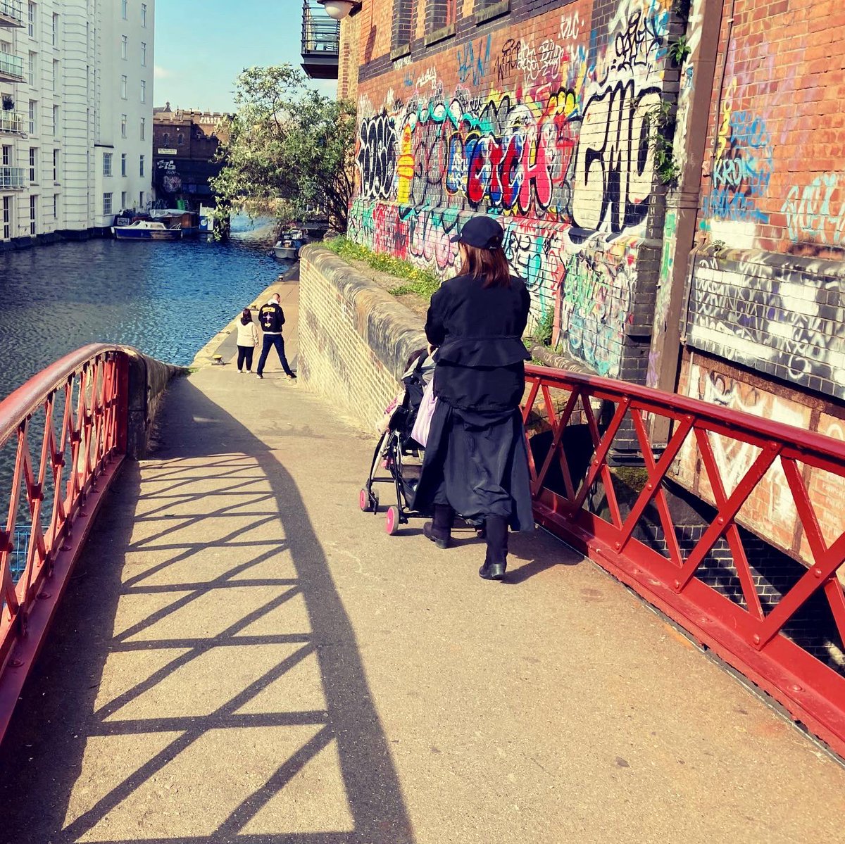 CRTSouthEast's tweet image. The sun shone on our Dead Dog Bridge reopening today, with the refurbished ironwork gleaming in Indian red livery, a nod to its LNWR rail heritage. The £533k project was enabled by an award from Postcode Earth Trust, thanks to funds raised by players of People’s Postcode Lottery.