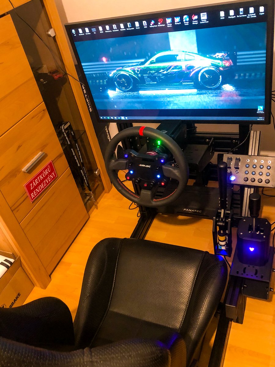 RaczDom's tweet photo. Yo, @GoosiestYT! Here's my setup:
It's a Simagic Alpha Mini base with GTS wheel, a VNM Shifter and VNM Handbrake, Fanatec CSL V2 pedals, a buttonbox from https://t.co/rOLFtC0Nrh, and all that on a SimXPro R80 Rig. I've cropped the picture because of the cables. :P
Stay Sideways! https://t.co/964gUwdbcI
