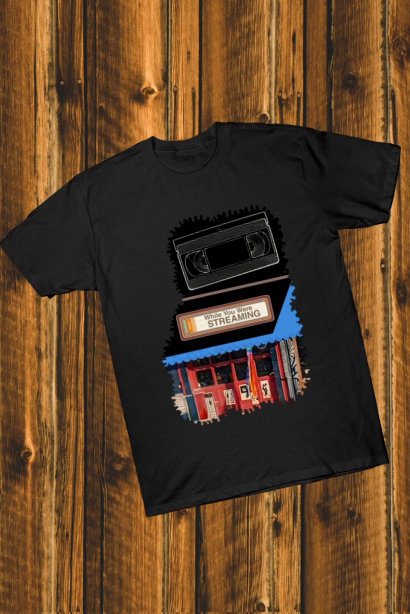 Lopardus's tweet photo. While You Were STREAMING Storefront T-Shirt 

#YellowJackets    #Yellowjackets  🐝  #season2 
#horror #tshirtdesign
#Whileyouwerestreaming #AntlerQueen 
#taissa #Van #VHS 

https://t.co/g8bimUpAUZ https://t.co/55dNEzwz7e