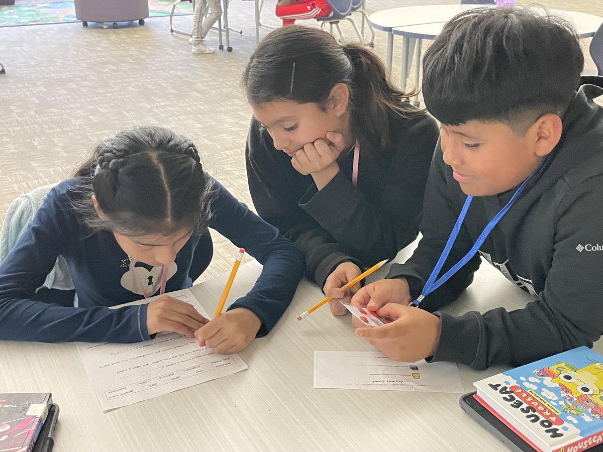 HPESLibrary's tweet photo. These students are using library skills to solve library themed puzzles for School Library Month! 📚 #howmanytimescanisaylibraryinonetweet @hunley_park @VOCALCCSD https://t.co/yKy9OriPIf