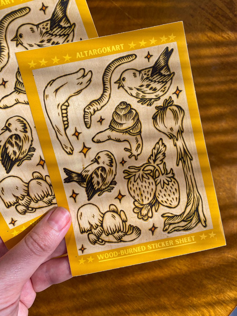 altargokart's tweet photo. I turned a wood-burned block into my first ever sticker sheet! Eight designs on the page for you to put on a letter, a sketchbook, a telephone pole.. available now!! https://t.co/LLpILd0mUh