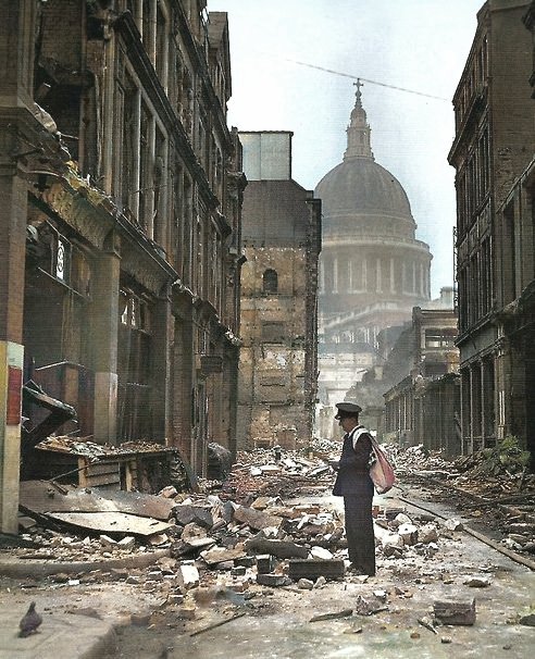 The postman wondering what to do with a package for an address which no longer exists in Watling Street, City of London, during W.W.2.
