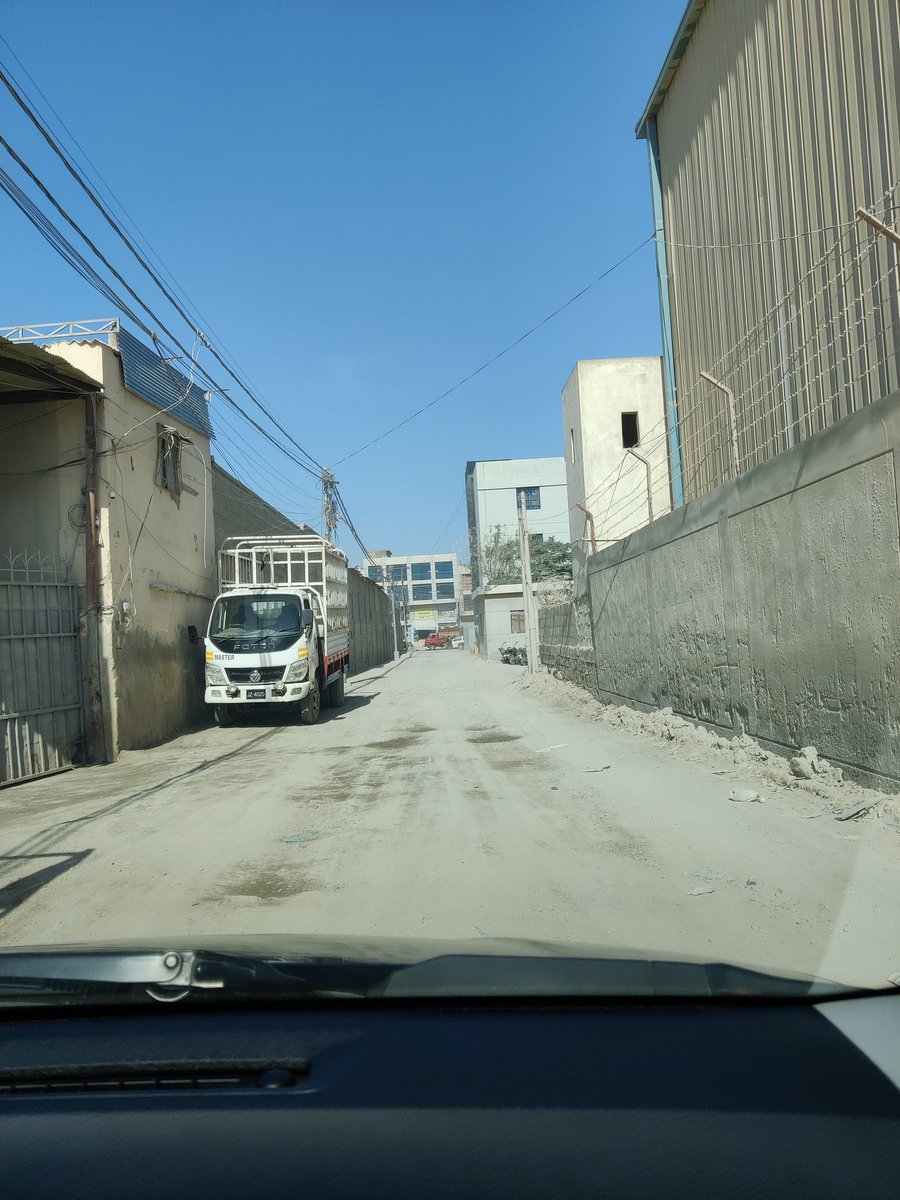 OsamaSarwar's tweet photo. @DrSyedSaifurReh Assalamualaikum, this is a street in Korangi Sector 5 where Burque Corporation is also located. Basically this street has no layering and has been in complete ruins for many years. It is requested that this street is paved as it will benefit thousands of workers. @murtazawahab1 https://t.co/BvWA6ss1DR