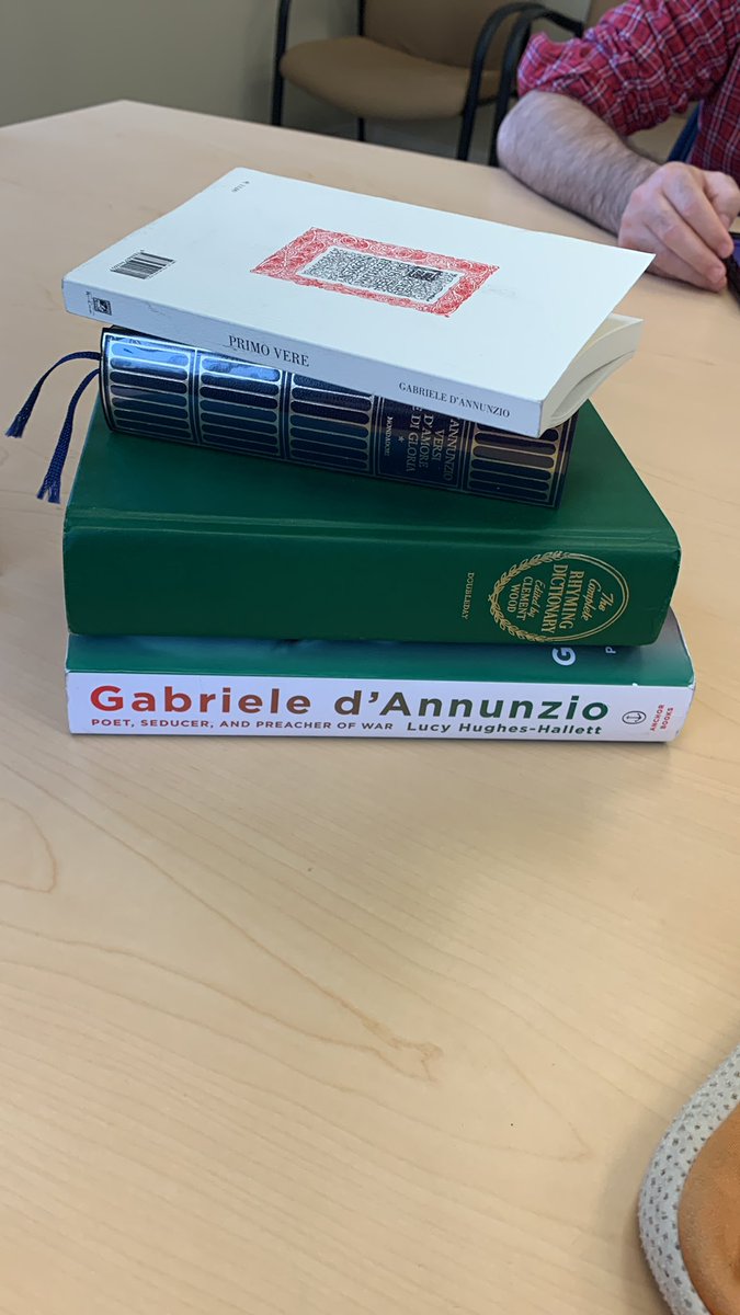 Doing that academic virtue signaling thing where you show up to present with a pile of books sitting ominously in front of you