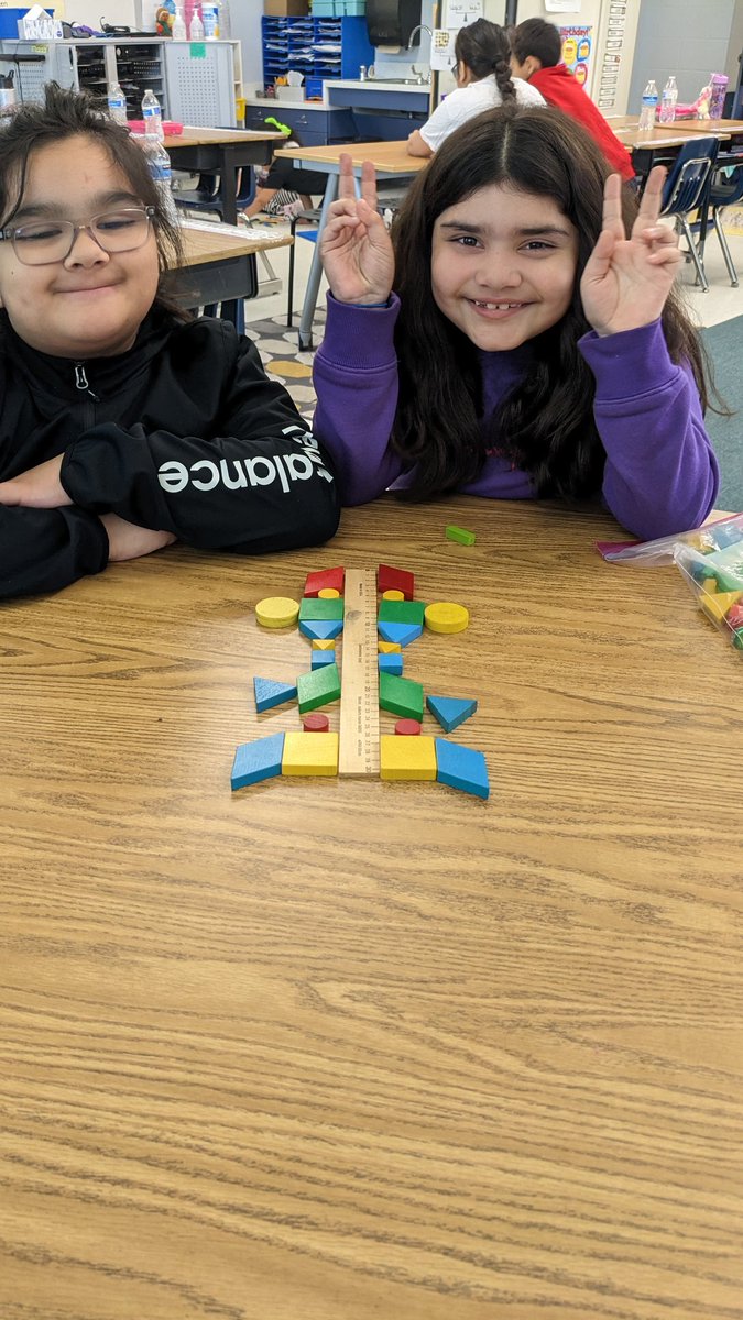 Feliciateach's tweet photo. Using shapes to show symmetry in math #symmetry #math #funlearning https://t.co/MAZYt3vgnI