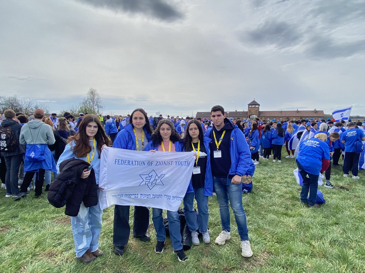 FZY's tweet photo. Today we joined 10,000 people on the March of the Living, from Auschwitz I to Birkenau, as part of the @MOTL_UK_ trip to Poland. On this Yom Hashoah, we once again pledge to make sure that we will never forget what happened to our people during the Holocaust. #YomHashoah https://t.co/xM761V0oFj