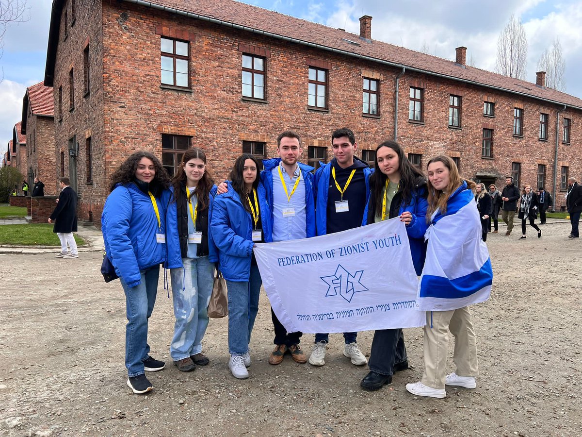 FZY's tweet photo. Today we joined 10,000 people on the March of the Living, from Auschwitz I to Birkenau, as part of the @MOTL_UK_ trip to Poland. On this Yom Hashoah, we once again pledge to make sure that we will never forget what happened to our people during the Holocaust. #YomHashoah https://t.co/xM761V0oFj