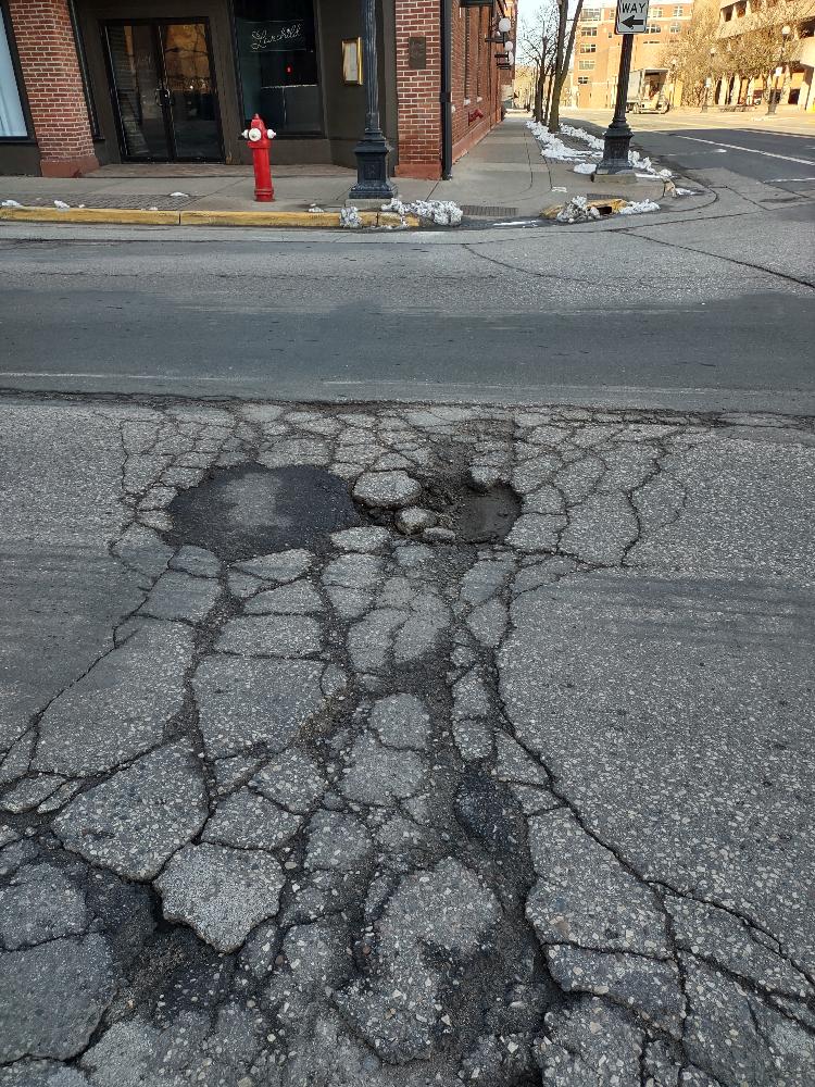 LaXWIForTransit's tweet photo. Thank you @aarpwi &amp; @IntrinsicPaths for a great and eye-opening walk today. We CAN have safe, healthy, quiet, pleasant streets for all ages &amp; abilities &amp; accessible public transit IF we insist. Let's start with #POTHOLES by the Transit Ctr (yes, THAT again!) #Bike/Ped>cars https://t.co/3DyyHMHUbj