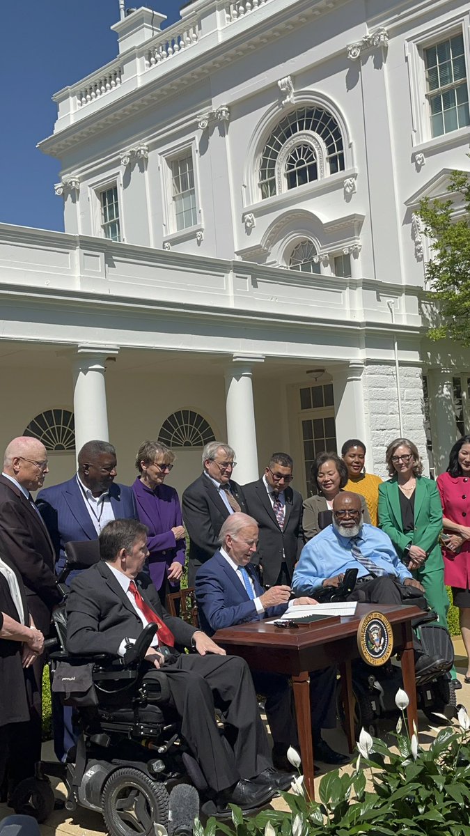 udw_union's tweet photo. UDW Executive Director @DMooreUDW, @AFSCME President Lee Saunders and others look on as @POTUS signs his historic executive order on care. What a momentous day! #CareWorkersCantWait https://t.co/REI4SvTN1d