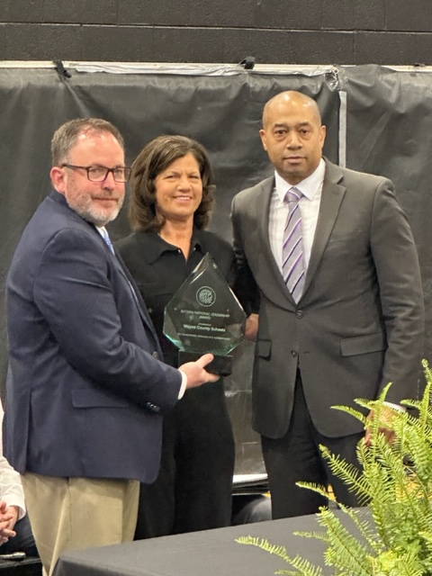 Parallel_PR's tweet photo. @SoterTech CEO @DerekP007 (r) presents the #SoteriaNationalLeadershipAward to West Virginia’s Wayne Public Schools superintendent #ToddAlexander and Wayne HS principal #SaraStapleton. The award recognizes successful anti-vaping and anti-bullying strategies. @rtehrani @Parallel_PR https://t.co/gjiQoj9QbC
