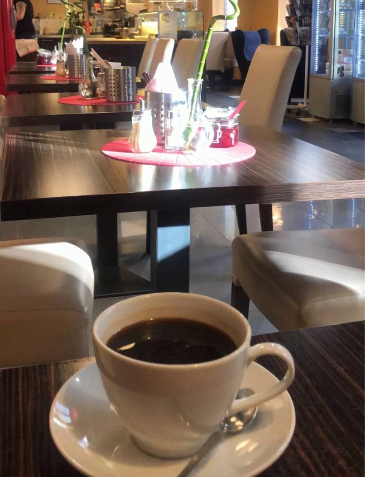 On this beautiful day, I am accompanied by a cup of aromatic and strong coffee. Nestled in a cozy corner, I am savoring the unique flavor of this coffee, enjoying the peace and satisfaction it brings.