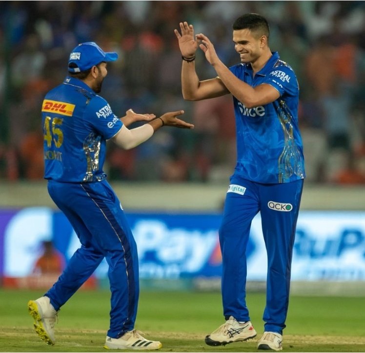 ImDannyKale's tweet photo. And finally, @arjun10dulkar24 finishes the game... Maiden IPL wicket... Many many more to come...
 @ImRo45 celebrates more than Jr. 10dulkar... Leadership quality in team members success... https://t.co/B0q9HsmsEA