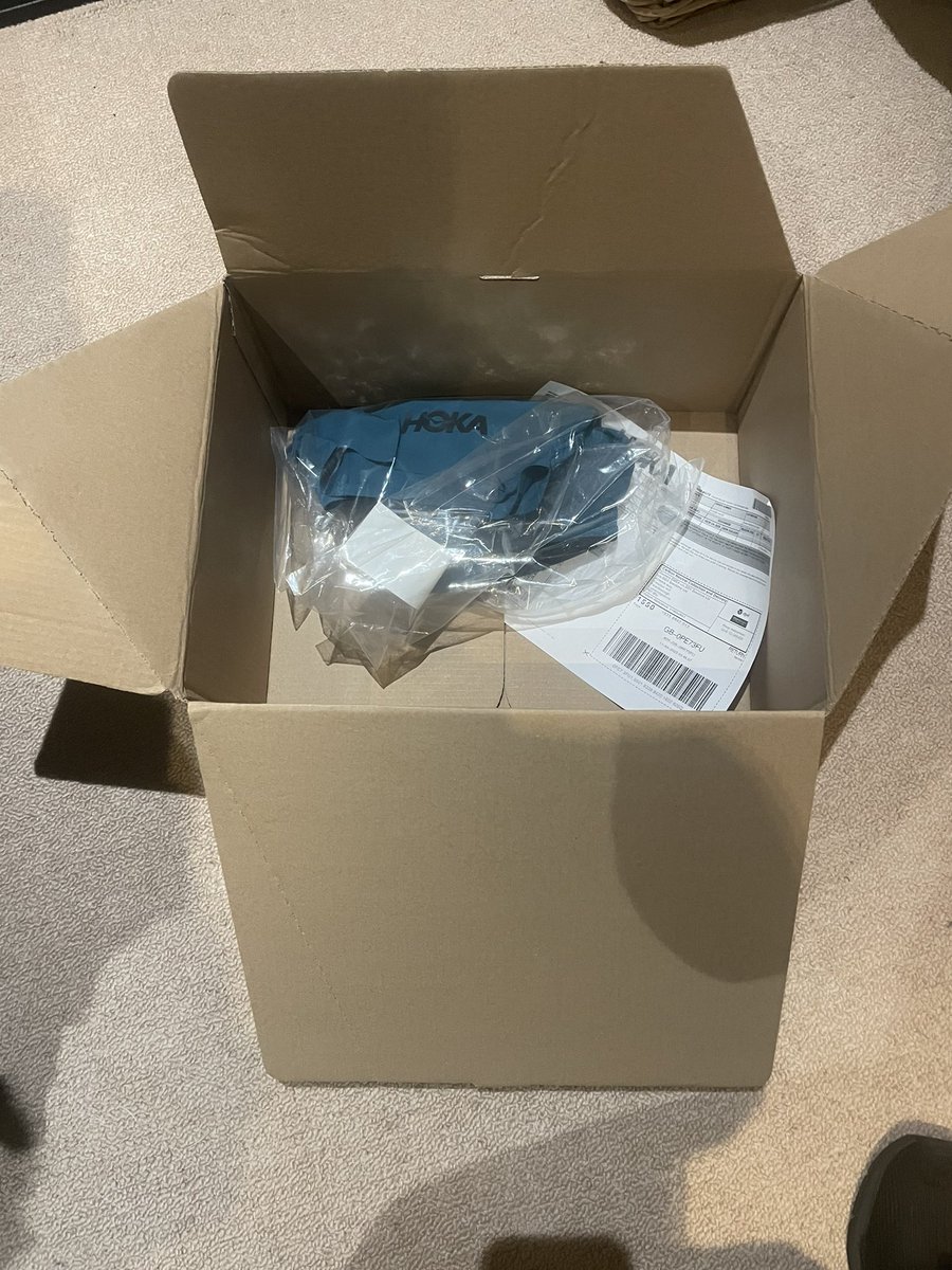 EwanMSmith's tweet photo. @hoka this amount of packaging for one small pair of running shorts is ridiculous. How is this necessary? #hoka https://t.co/LZNTro3eaG