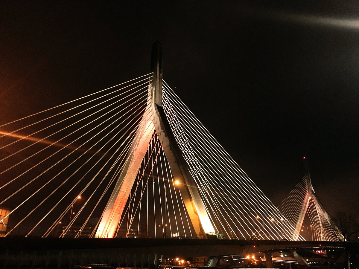 MassDOT's tweet photo. Tonight 4/18 the #ZakimBridge #LongfellowBridge #ForeRiverBridge and #BurnsBridge will light orange for National Work Zone Awareness Week #NWZAW. https://t.co/zs4EgbjTcQ