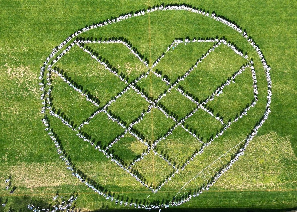 BoysLatinSchool's tweet photo. Boys in grades K-12 participated in our One Laker | One Love Day. Our entire community gathered to form a giant One Love heart affirming our commitment to fostering healthy relationships. We are #OneBL https://t.co/f54NYa3AOZ