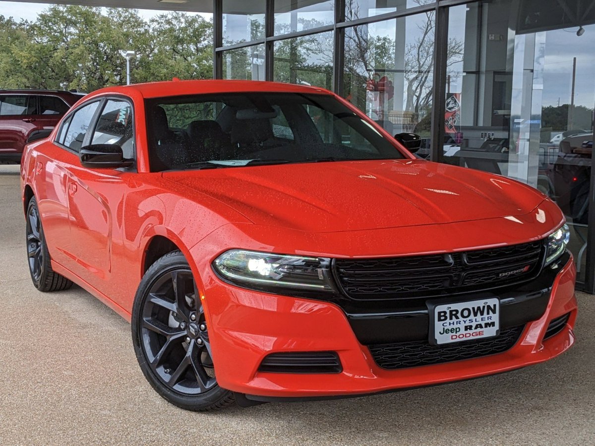 BrownCDJR's tweet photo. With its jaw-dropping curves and precise handling, the Dodge Charger knows how to deliver the perfect driving experience every time. Shop for yours at Brown Dodge Chrysler Jeep Ram: https://t.co/ICzfEGRiu6 https://t.co/n78igSKY8l