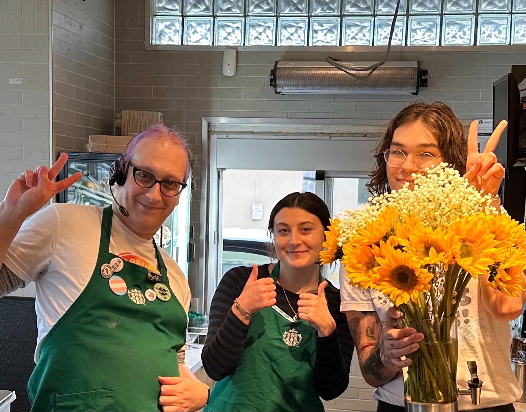 A victory photo showing 3 of the amazing Baristas from the West 5th store celebrating their achievement! Union strong!