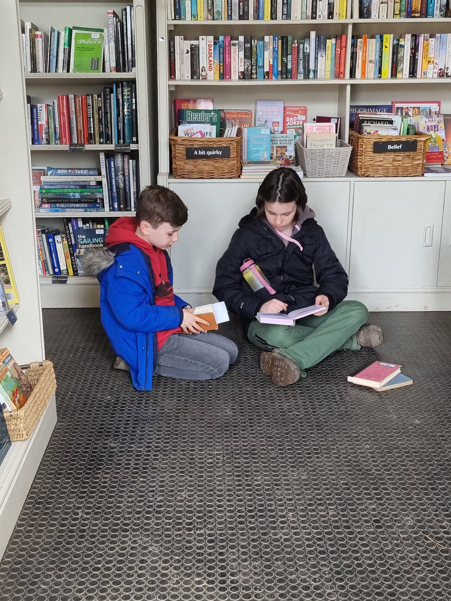 MrsTheBrindo's tweet photo. Bookworm kids. Note the name on the box above Lottie's head. Very apt. https://t.co/WAXzCogWj9