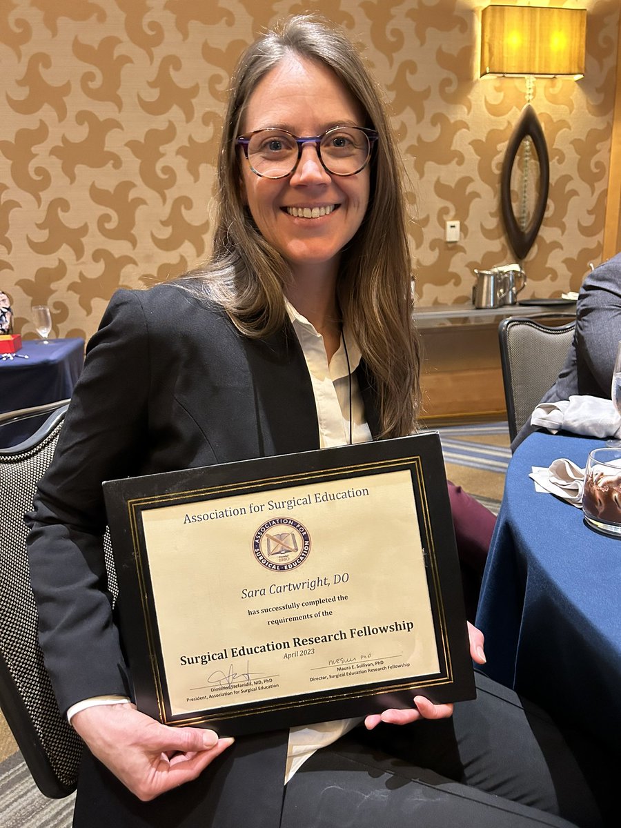 UNMCSurgery's tweet photo. Dr. Sara Cartwright receiving her Surgical Education Research Fellowship certificate at the Association for Surgical Education annual meeting. She presented her SERF project on mentorship in surgical residency. @Surg_Education https://t.co/bX61R6GNXG