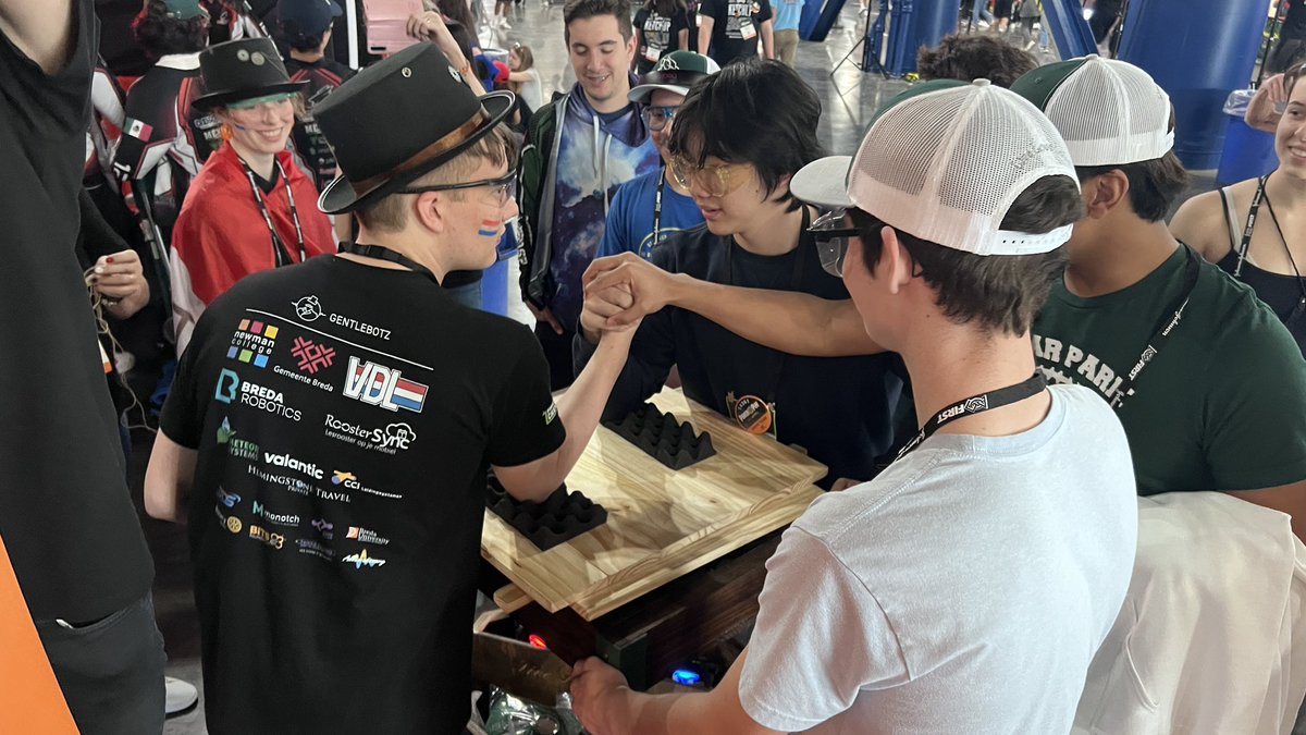 wmatistic's tweet photo. How do you make friends at the Robotics World Championship?  RoboLobos walk around challenging people to arm wrestle.  Mexico and the Netherlands were the first to go down https://t.co/QmrPSNBpMC