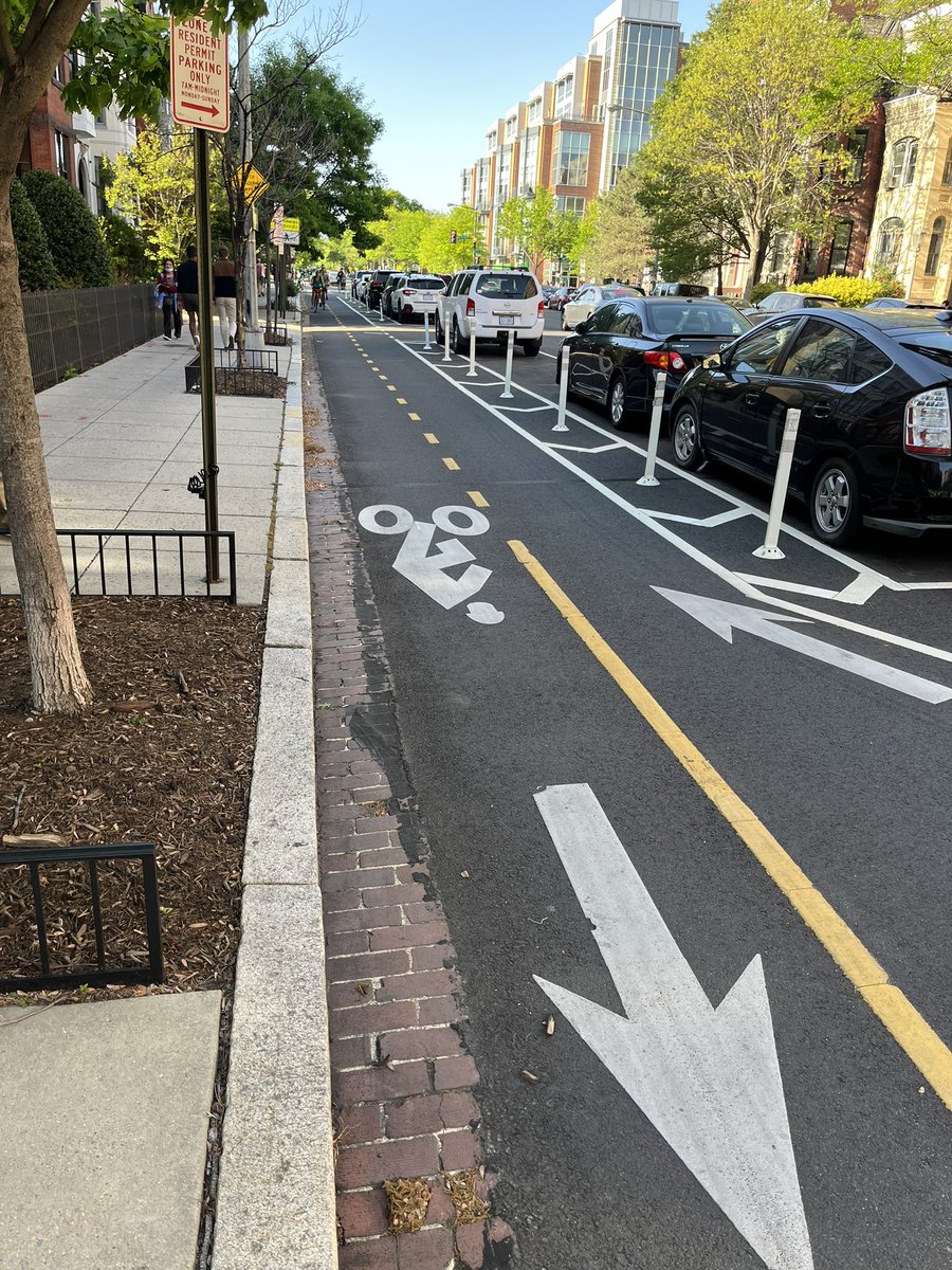 JenLitowski's tweet photo. A good number of streets do have separated bike lanes. I hope they put them everywhere. I’m less convinced about two-way bike lanes unless they were significantly wider. https://t.co/lPvDc1sgrN