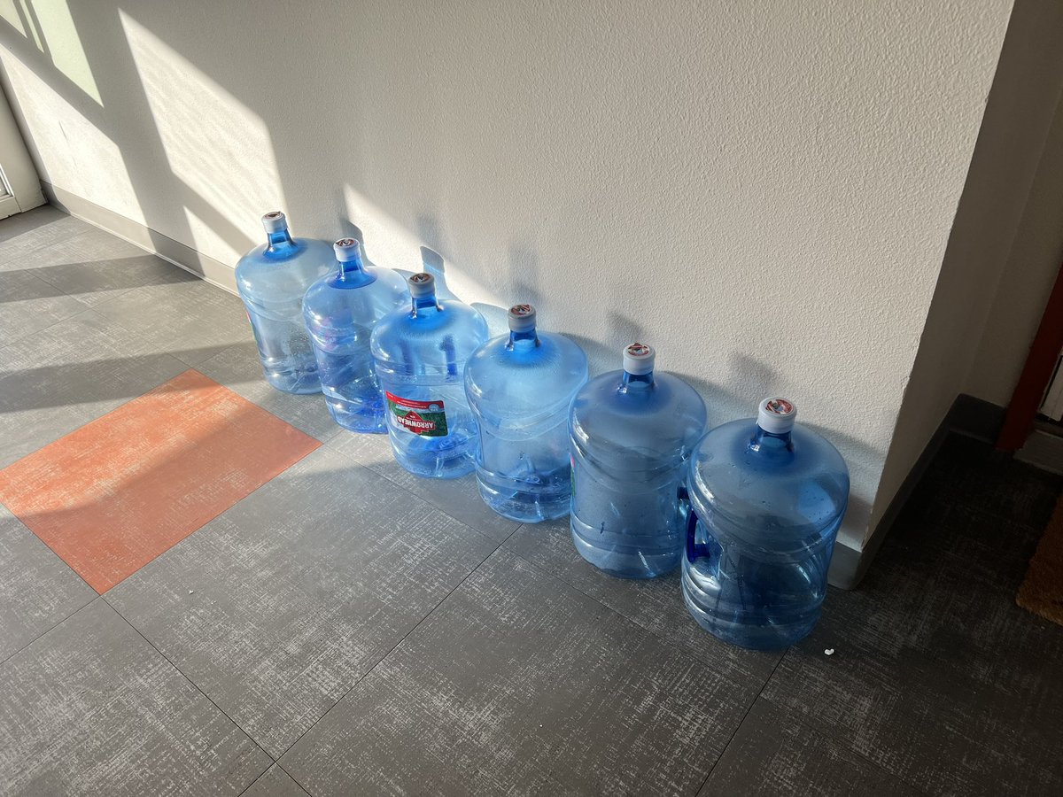 Bevan_Smith's tweet photo. @ReadyRefresh Got a message today at 14:31 saying my water was delivered. It’s now 18:41 and all I have outside my apartment is empty containers 😤 https://t.co/7KjGjdJIeO