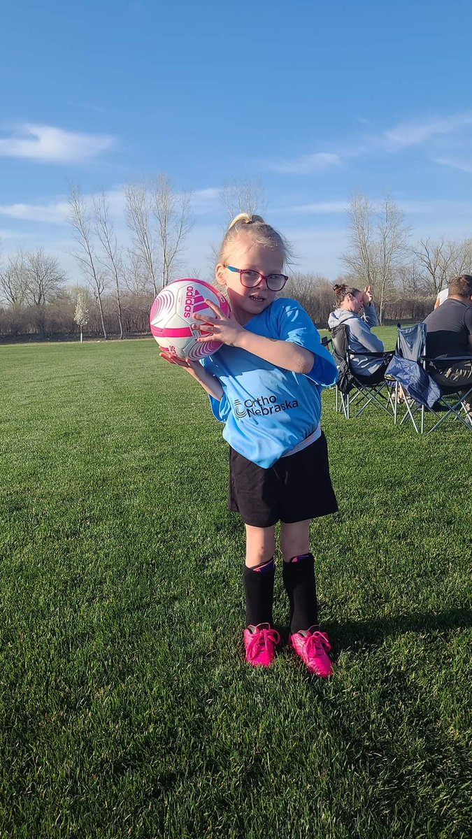 My mini miracle rocking the neon pink soccer shoes. #VivianRocks #MicroPreemie