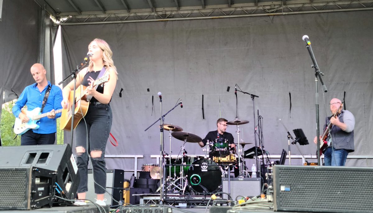DevonFest's tweet photo. Who was there our first year back in the summer of 2021? It was rockin' with Dan Davidson, Nice Horse, Kym Simon, Martina Dawn and Wiklund vs Wiklund...ahhh...that was a good day! https://t.co/XoEv388U3C! #devonfest #yegmusic #summerconcerts #countryconcert https://t.co/DQPP90hjPT